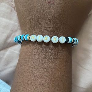 black white and blue bracelet
